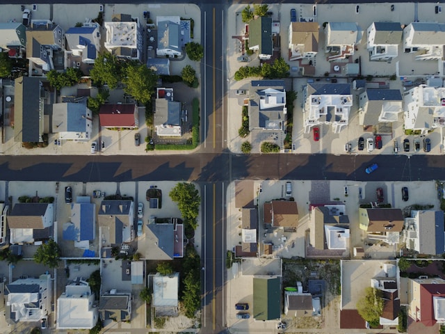 single family homes aerial photo from above as home help during inflation