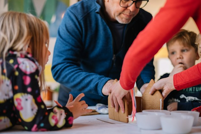 real estate syndication investor enjoying time with his grandkids after successfully investing in real estate