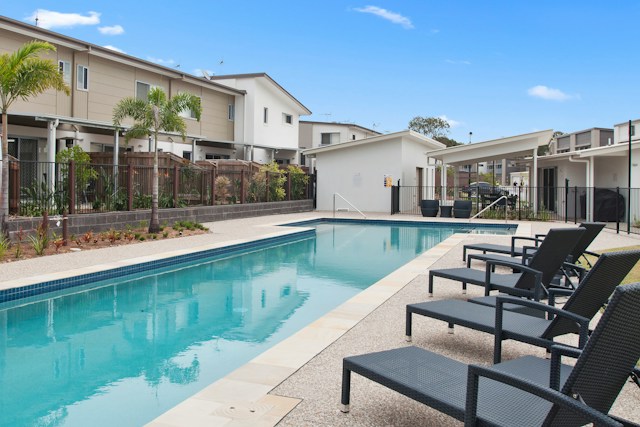 a pool for residents at a property purchased through a recent real estate syndication deal